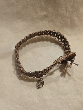 Handwoven Brown Hemp Bracelet with Leaf Charm